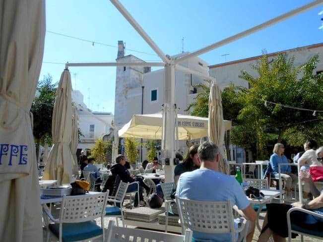 Outdoor cafes are popular in Monopoli’s piazza. Photo by Carol L. Bowman  