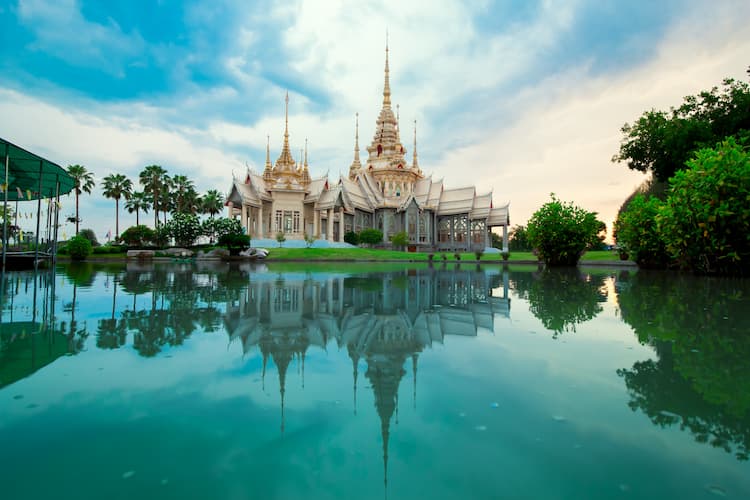 Beige Temple Reflecting on Body of Water, Thailand