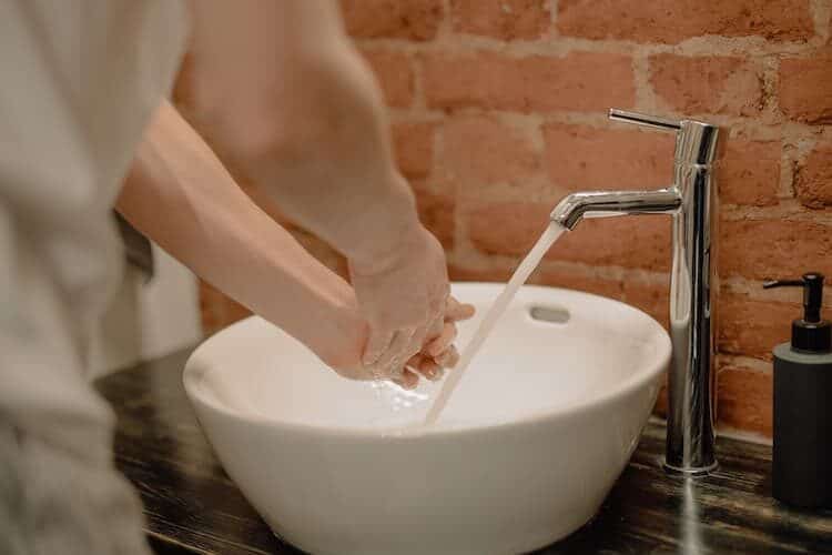 Hand washing. Photo by cottonbro