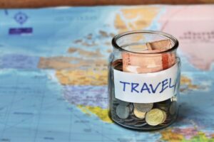 Ultimate guide to saving money on your next trip. Image by lovelyday12 from Getty Images via Canva