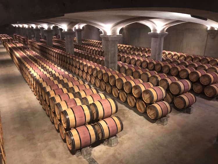 Aging barrels of wine. Photo by Edouard Chassaigne