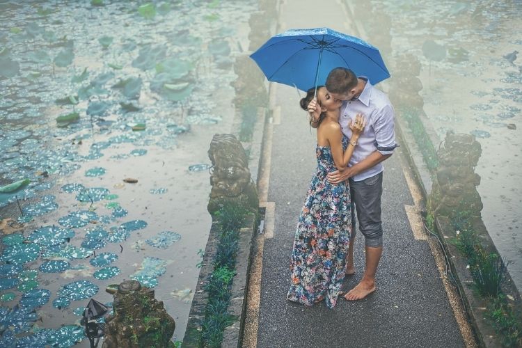 Bali couple in rain 
