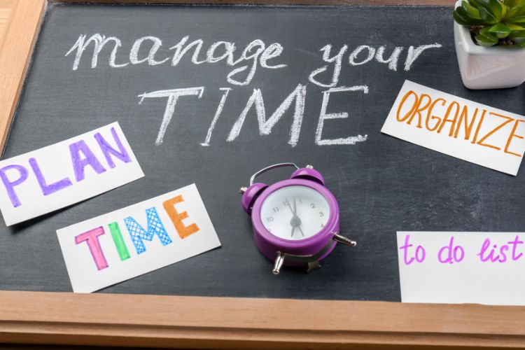 Chalk board saying manage your time