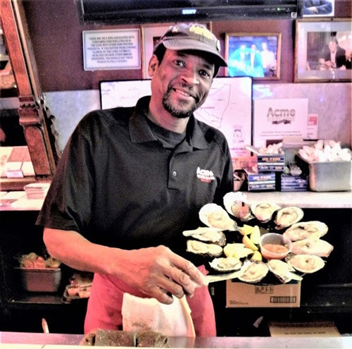 Michael Broadway has made oyster shucking a star attraction at New Orleans’ famous Acme Oyster Bar. Photo by Victor Block