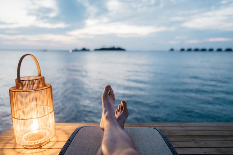 Relaxing on a beach in the Maldives. Photo by S Migaj