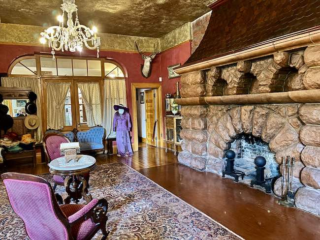 The massive fireplace in the parlor. Photo by Claudia Carbone