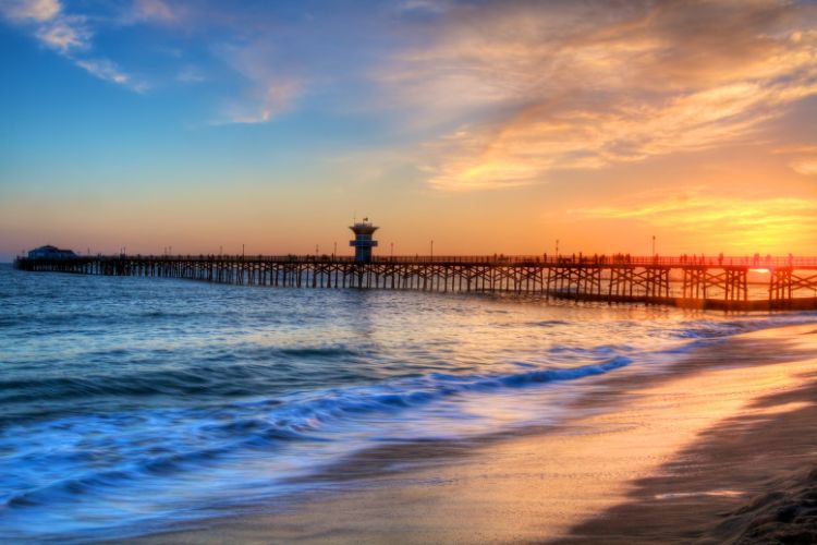 Sunset over the pier at Seal Beach