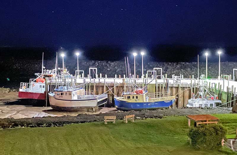 Lobster boats at low tide along the Bay of Fundy in New Brunswick. Photo by Janna Graber
