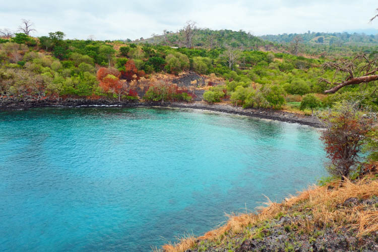 The Blue Lagoon is a sheltered cove with a rock shelf for snorkeling