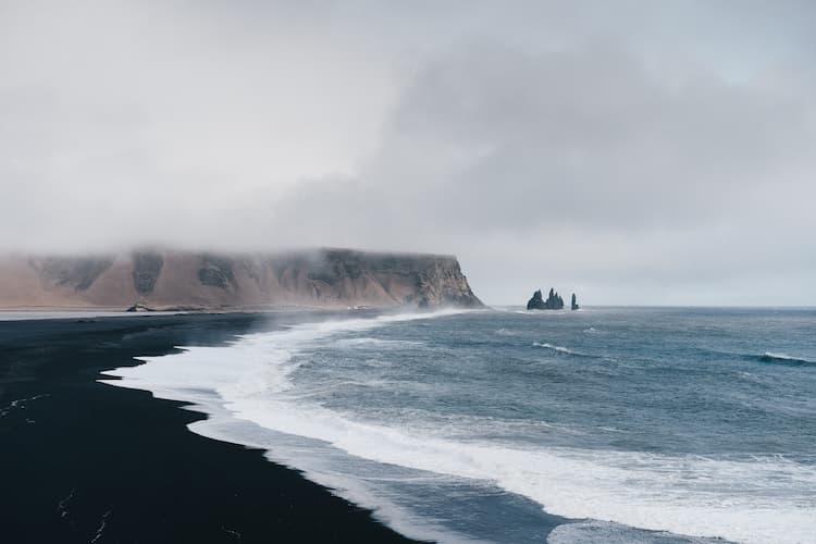 Black sand beach in Vik, Iceland. Photo by Adam Jang, Unsplash