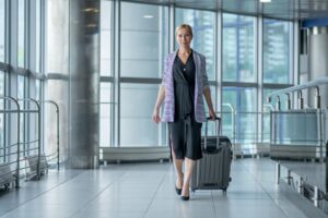 Woman in Airport. Photo by Unsplash Plus
