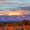 Taos Valley, New Mexico at sunset with a thunderstorm developing on the east side of the Sangre de Cristo Mountains. Photo by MonaMakela via iStock