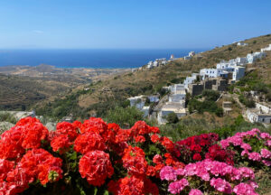 Terraced hills tumble down towards the sea in Tinos, Greece