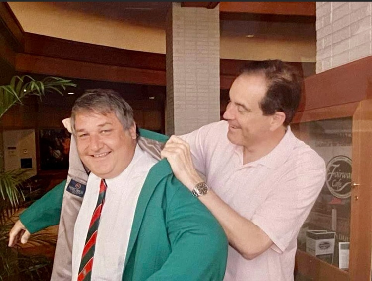 Michael Patrick Shiels receives the “green jacket” from Jim Nantz