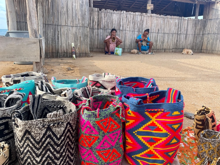 Wayúu women weave their legendary mochila bags at Rancheria Utta