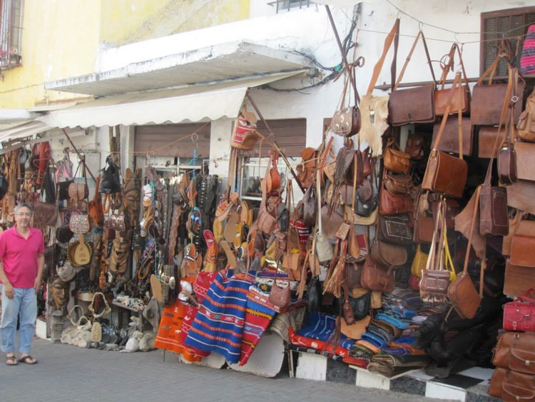 Choose from handbags, briefcases, or belts at the leather market