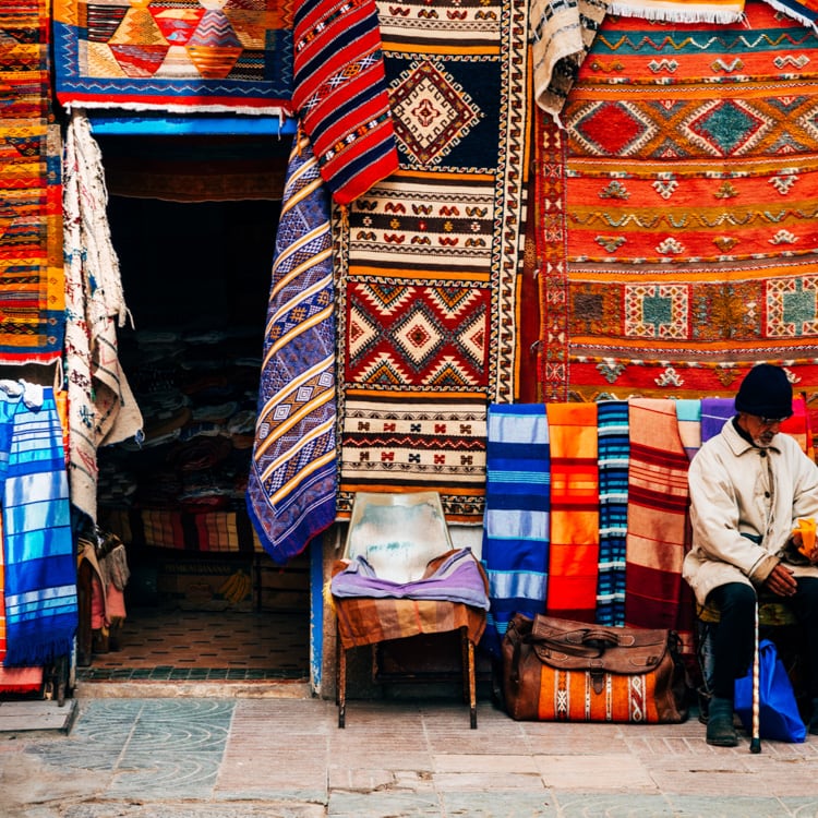 handwoven rugs in the marketplace