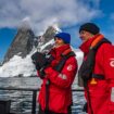 Antarctica Couple with Binoculars. Photo courtesy of Viking