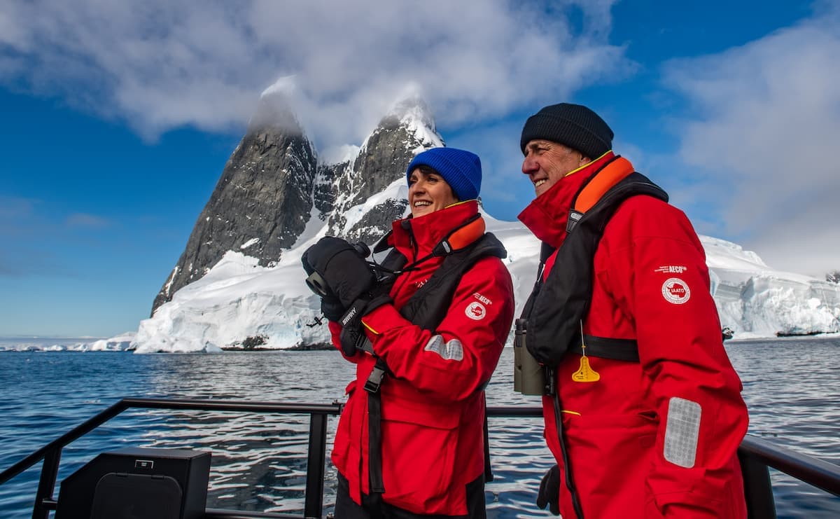 Antarctica Couple with Binoculars. Photo courtesy of Viking