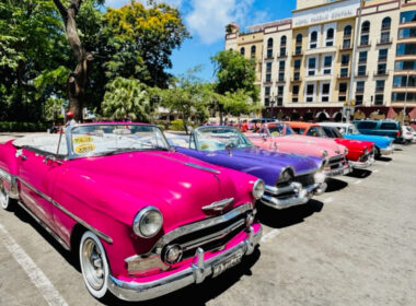 Havana Cuba Gran Hotel Manzana colorful cars
