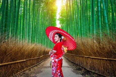 Walking through the bamboo forets in Kyoto is one of the top things to do in Japan. Image by tawatchaiprakobkit from Getty Images Pro via Canva