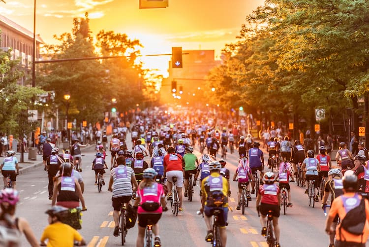 Thousands of riders annually take part in Go Bike Montreal, a week-long festival that includes the kickoff Tour La Nuit, which has riders taking over the streets of Montreal after sunset. (Maxime Juneau)