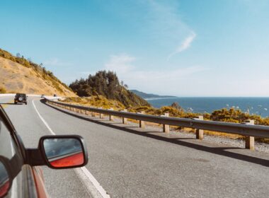 Driving on the road. Photo by Cristofer Maximilian, Unsplash