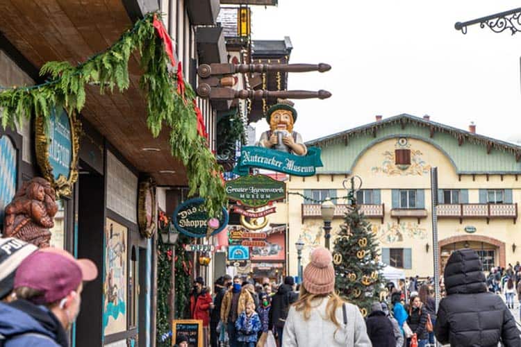 People meander through a Bavarian-inspired village in Leavenworth, Washington.