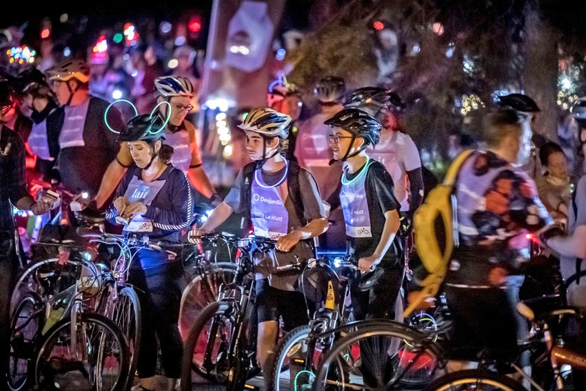 Thousands of riders annually take part in Go Bike Montreal, a week-long festival that includes the kickoff Tour La Nuit, which has riders taking over the streets of Montreal after sunset. (Francois Poirier)