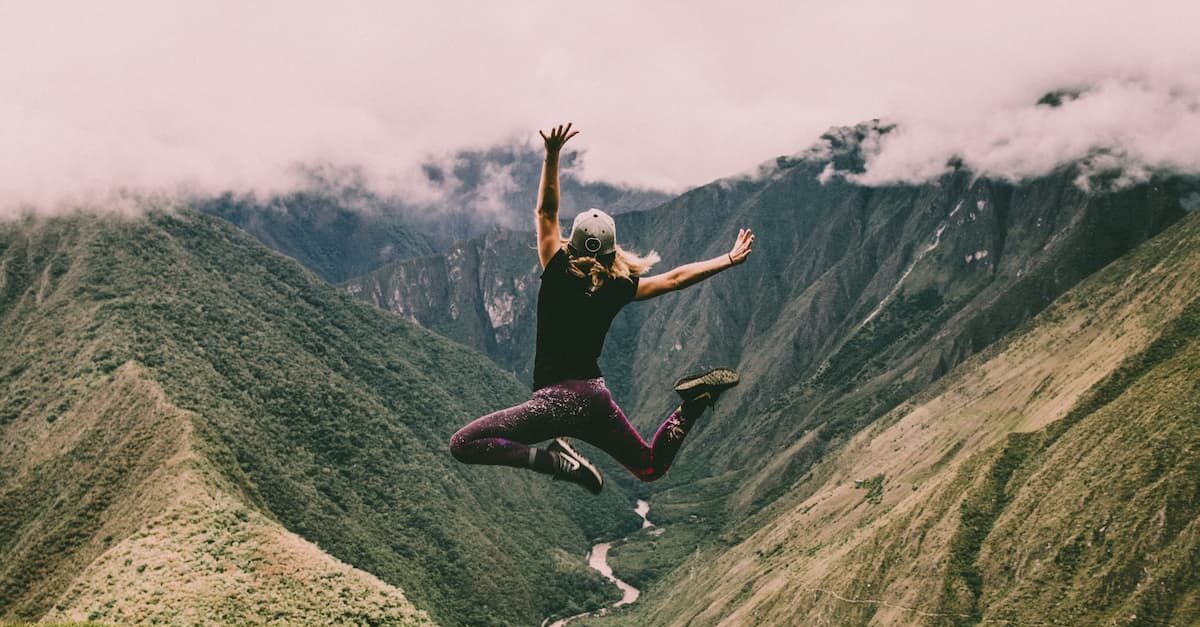 Woman jumping in Peru. Photo by Peter Conlan, Unsplash