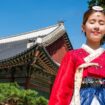 Woman wearing traditional Korean dress. Photo by Johen Redman, Unsplash Stay connected hassle-free with eSIM technology