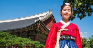 Woman wearing traditional Korean dress. Photo by Johen Redman, Unsplash Stay connected hassle-free with eSIM technology