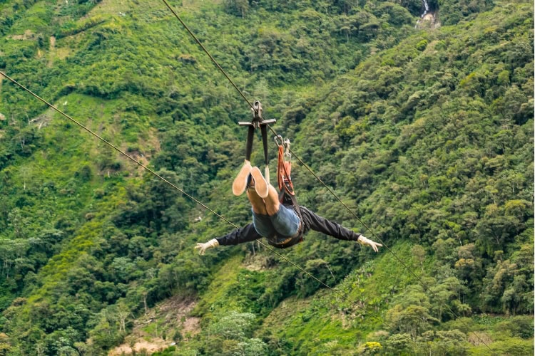 Ziplining in Ecuador. Photo by DanFLCreativo via Canva