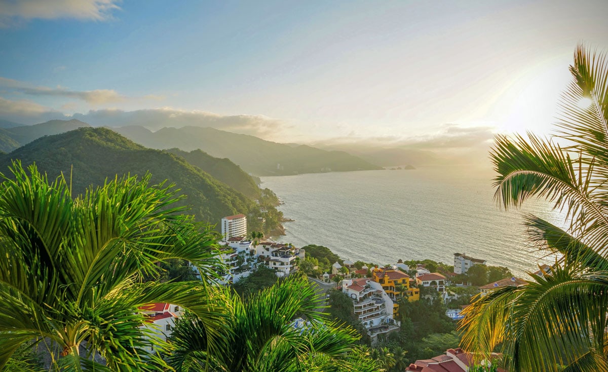 Many are choosing to move to Puerto Vallarta, Mexico. Photo by Chris McQueen on Unsplash