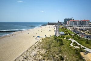 Asbury is a great beach town escape from NYC. Image by WoodysPhotos from Getty Images via Canva