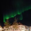 The aurora dance over Reykjavik on a clear September night. Photo by Annmarie McQueen, Pinterest