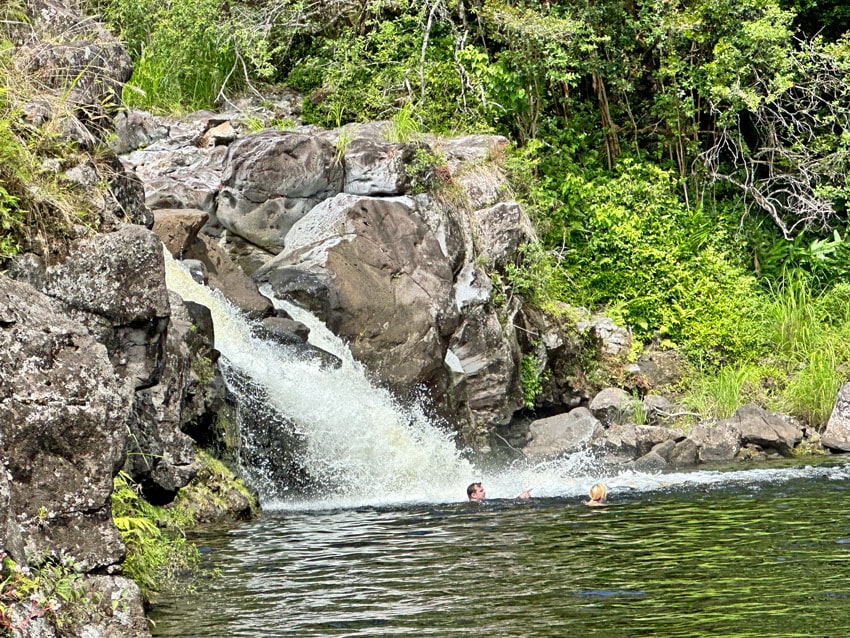 Swimming in a waterfall on the Island of Hawaii