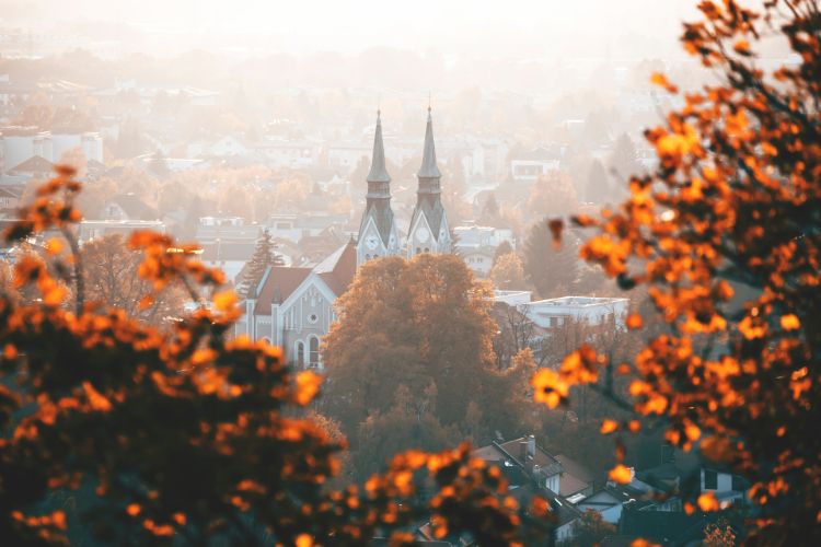 Panorama of the city of Ljubljana at sunset in autumn. An amazing Fall Destinations in Europe By Francesca Emer