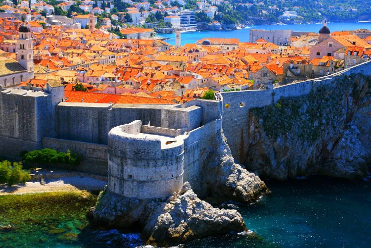 Dubrovnik, famous touristic destination in Croatia, view to old city walls and fort Bokar By Simun Ascic
