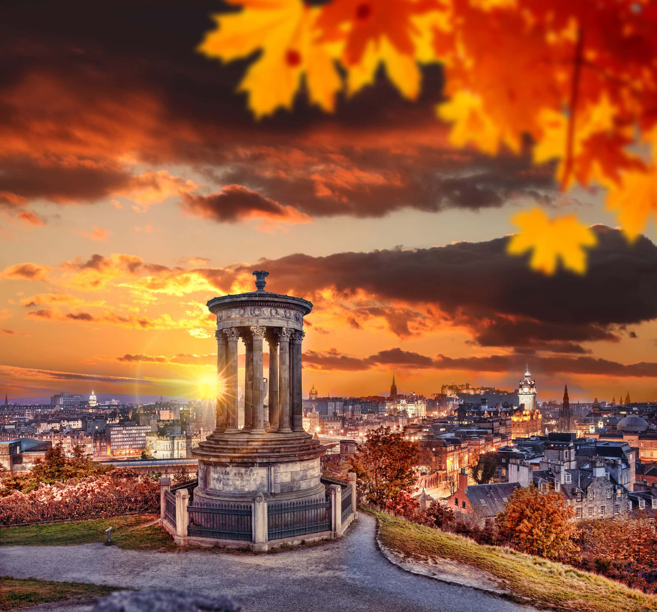 Edinburgh with Calton Hill against autumn leaves in Scotland. By Tomas Marek