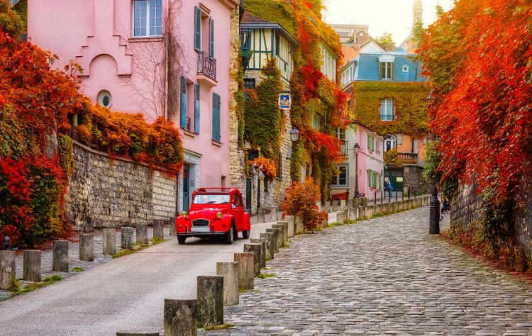 Cozy street in quarter Montmartre in Paris, France. Architecture and landmarks of Paris. By Ekaterina Belova