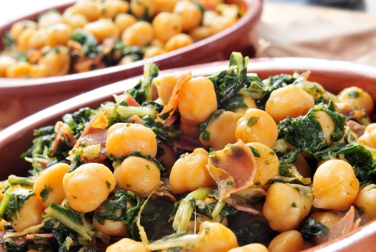 Traditional tapas in Seville spinach with chickpeas, served By nito
