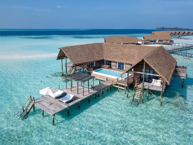 Ariel view of the overwater villa at COMO Cocoa Island. Photo by COMO Hotels