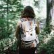 Hiker with a large backpack. Photo by Jake Melara, Unsplash