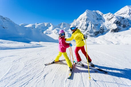 Family ski days in Italy combine adventure, scenery, and plenty of fun. Photo from iStock
