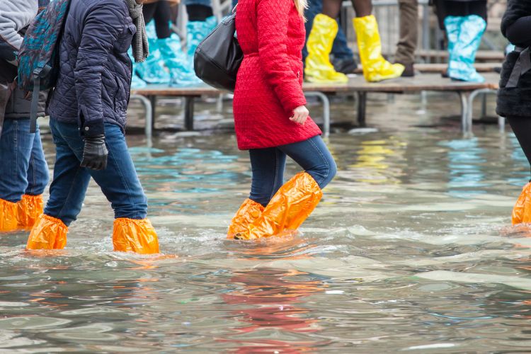 High waters in Venice require rain boots