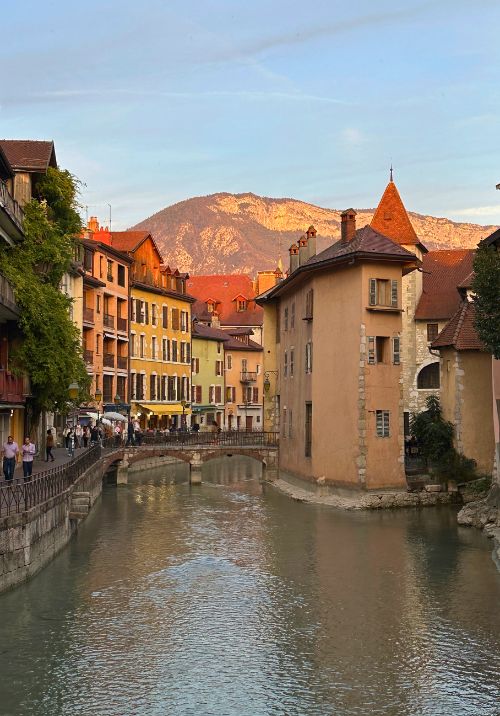 Canals carving through colorful medieval style buildings. Photo by Isabella Miller