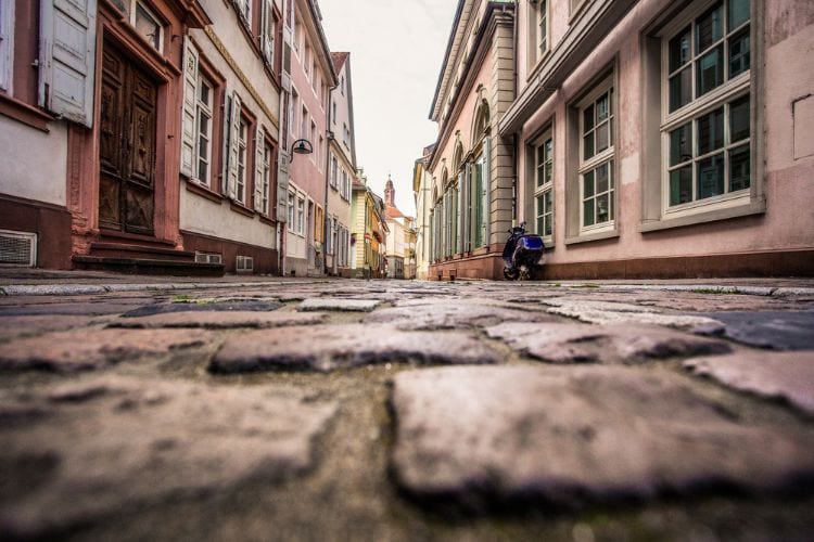Be wary of bumpy cobblestone streets. Photo by Canva