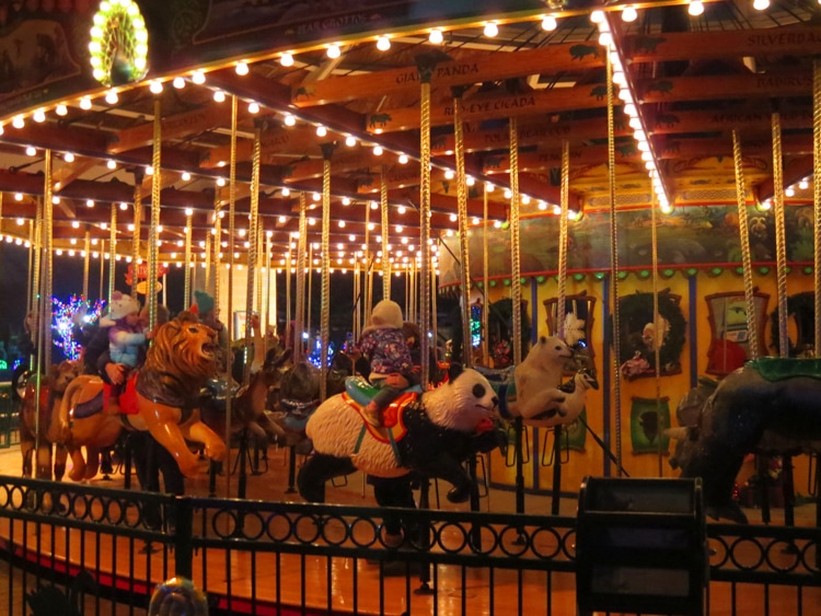 Children enjoy the park's colorful carousel and its 72 carved wooden animals