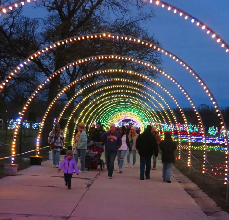 Families stroll through the 600-foot-long Tunnel of Lights